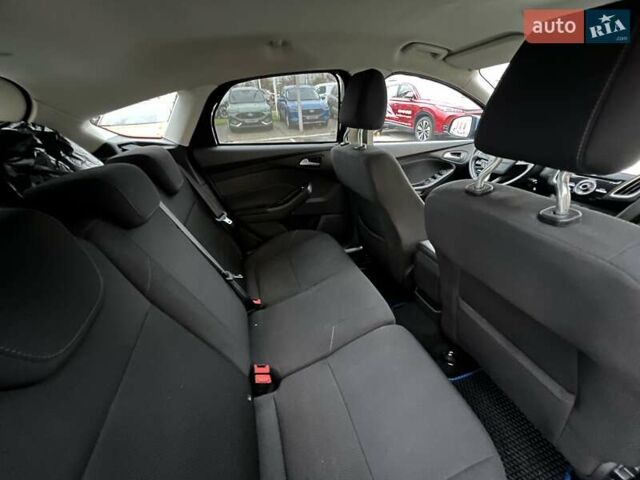 Синий Форд Фокус, объемом двигателя 1 л и пробегом 66 тыс. км за 11773 $, фото 20 на Automoto.ua