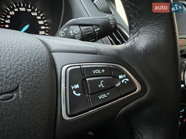 Синий Форд Фокус, объемом двигателя 1 л и пробегом 66 тыс. км за 11773 $, фото 26 на Automoto.ua