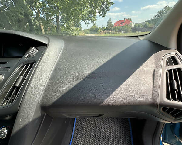 Синій Форд Фокус, об'ємом двигуна 1 л та пробігом 108 тис. км за 7500 $, фото 18 на Automoto.ua