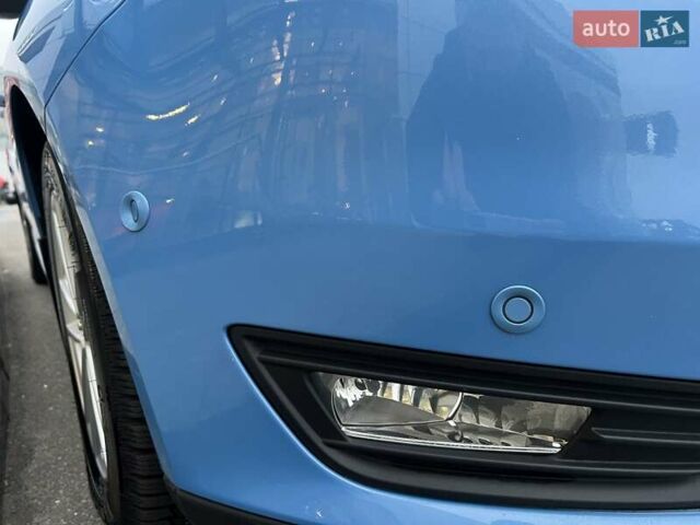 Синий Форд Фокус, объемом двигателя 1 л и пробегом 66 тыс. км за 11773 $, фото 8 на Automoto.ua