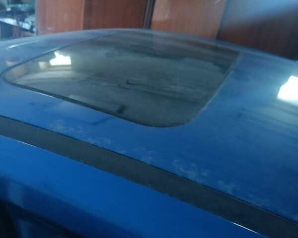 Синий Форд Фокус, объемом двигателя 2 л и пробегом 145 тыс. км за 9600 $, фото 5 на Automoto.ua