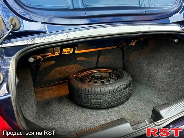 Синій Форд Фокус, об'ємом двигуна 1.8 л та пробігом 318 тис. км за 3100 $, фото 9 на Automoto.ua