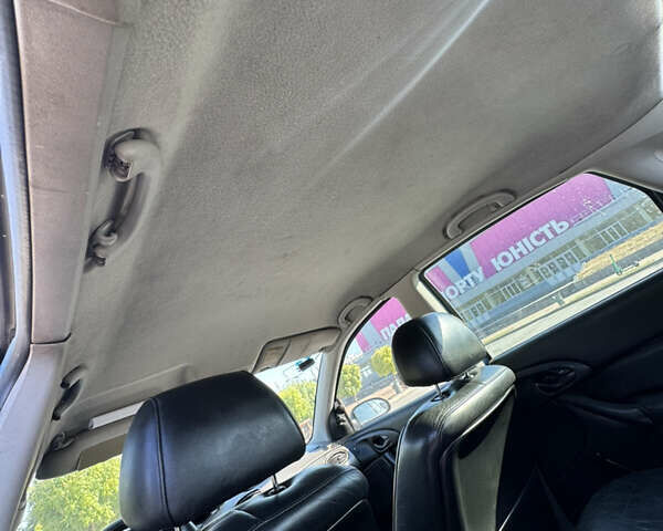 Синий Форд Фокус, объемом двигателя 2 л и пробегом 174 тыс. км за 3100 $, фото 14 на Automoto.ua