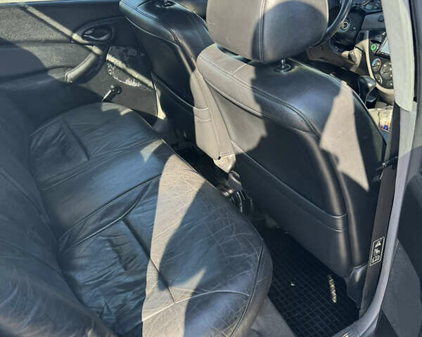 Синий Форд Фокус, объемом двигателя 2 л и пробегом 174 тыс. км за 3100 $, фото 10 на Automoto.ua