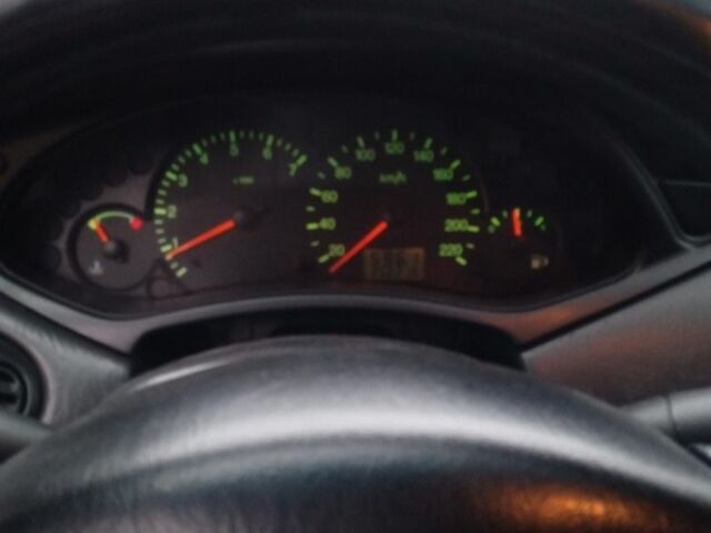 Синий Форд Фокус, объемом двигателя 1.8 л и пробегом 338 тыс. км за 2367 $, фото 6 на Automoto.ua