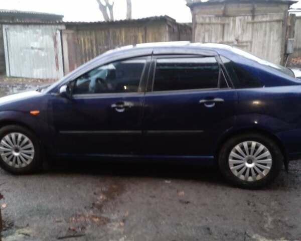 Синий Форд Фокус, объемом двигателя 1.8 л и пробегом 338 тыс. км за 2367 $, фото 7 на Automoto.ua