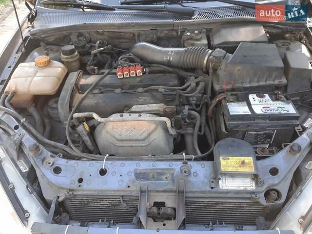 Синий Форд Фокус, объемом двигателя 1.8 л и пробегом 279 тыс. км за 2950 $, фото 12 на Automoto.ua