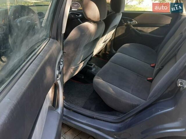 Синий Форд Фокус, объемом двигателя 1.8 л и пробегом 279 тыс. км за 2950 $, фото 2 на Automoto.ua