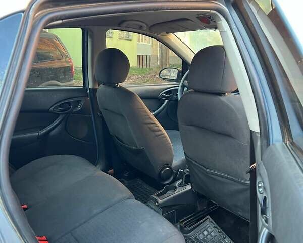 Синий Форд Фокус, объемом двигателя 1.6 л и пробегом 300 тыс. км за 3300 $, фото 8 на Automoto.ua