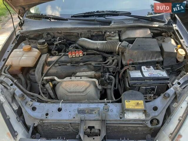 Синий Форд Фокус, объемом двигателя 1.8 л и пробегом 279 тыс. км за 2950 $, фото 13 на Automoto.ua