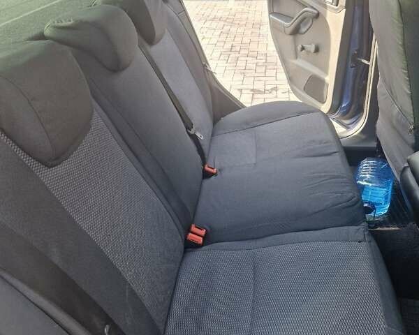 Синий Форд Фокус, объемом двигателя 1.6 л и пробегом 142 тыс. км за 4600 $, фото 3 на Automoto.ua