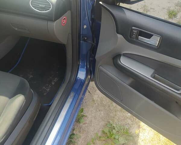 Синий Форд Фокус, объемом двигателя 1.6 л и пробегом 270 тыс. км за 5600 $, фото 25 на Automoto.ua