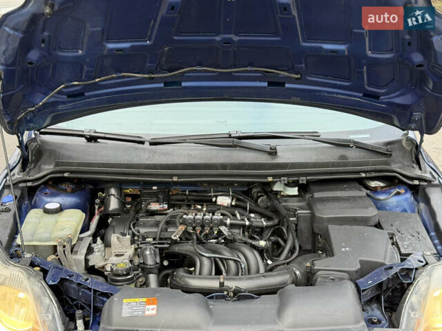 Синий Форд Фокус, объемом двигателя 1.6 л и пробегом 316 тыс. км за 4499 $, фото 10 на Automoto.ua