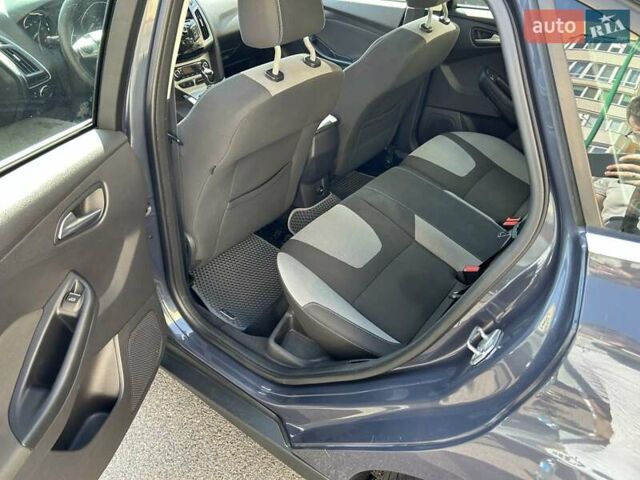 Синій Форд Фокус, об'ємом двигуна 1.6 л та пробігом 147 тис. км за 7799 $, фото 31 на Automoto.ua