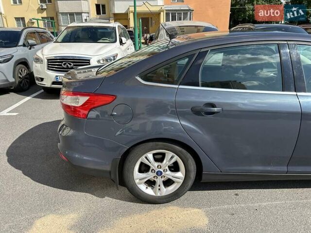 Синій Форд Фокус, об'ємом двигуна 1.6 л та пробігом 147 тис. км за 7799 $, фото 13 на Automoto.ua