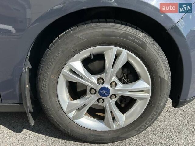 Синій Форд Фокус, об'ємом двигуна 1.6 л та пробігом 147 тис. км за 7799 $, фото 9 на Automoto.ua