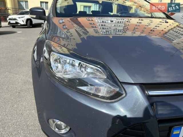 Синій Форд Фокус, об'ємом двигуна 1.6 л та пробігом 147 тис. км за 7799 $, фото 4 на Automoto.ua