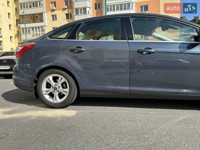 Синій Форд Фокус, об'ємом двигуна 1.6 л та пробігом 147 тис. км за 7799 $, фото 11 на Automoto.ua