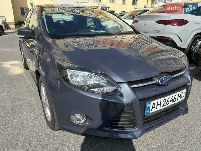Синій Форд Фокус, об'ємом двигуна 1.6 л та пробігом 147 тис. км за 7799 $, фото 3 на Automoto.ua