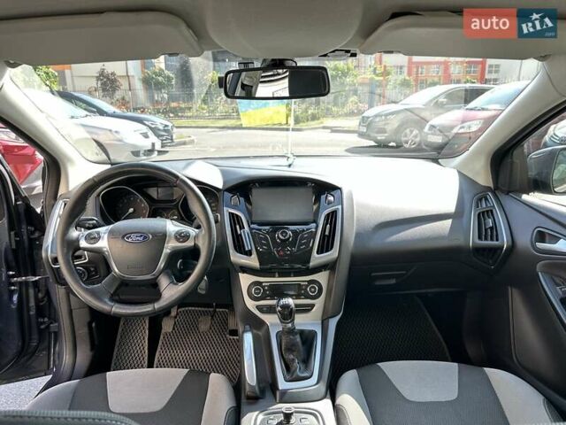 Синій Форд Фокус, об'ємом двигуна 1.6 л та пробігом 147 тис. км за 7799 $, фото 65 на Automoto.ua