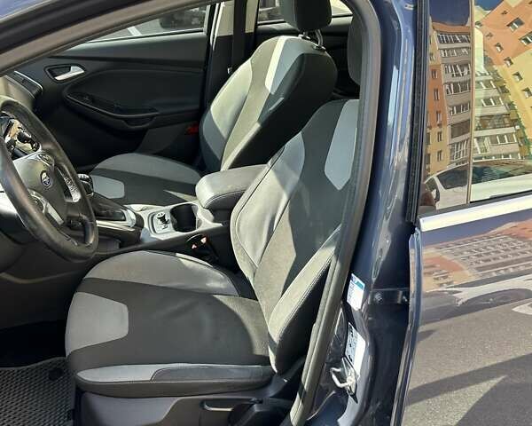 Синій Форд Фокус, об'ємом двигуна 1.6 л та пробігом 147 тис. км за 7799 $, фото 29 на Automoto.ua