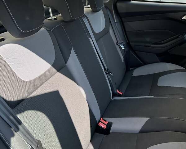 Синій Форд Фокус, об'ємом двигуна 1.6 л та пробігом 147 тис. км за 7799 $, фото 57 на Automoto.ua