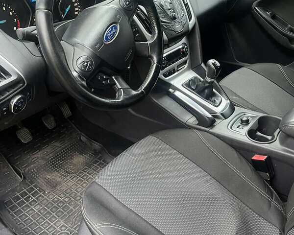 Синий Форд Фокус, объемом двигателя 1.6 л и пробегом 264 тыс. км за 7000 $, фото 5 на Automoto.ua