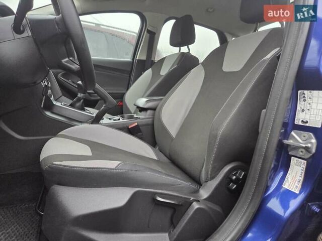 Синій Форд Фокус, об'ємом двигуна 1 л та пробігом 176 тис. км за 7300 $, фото 14 на Automoto.ua