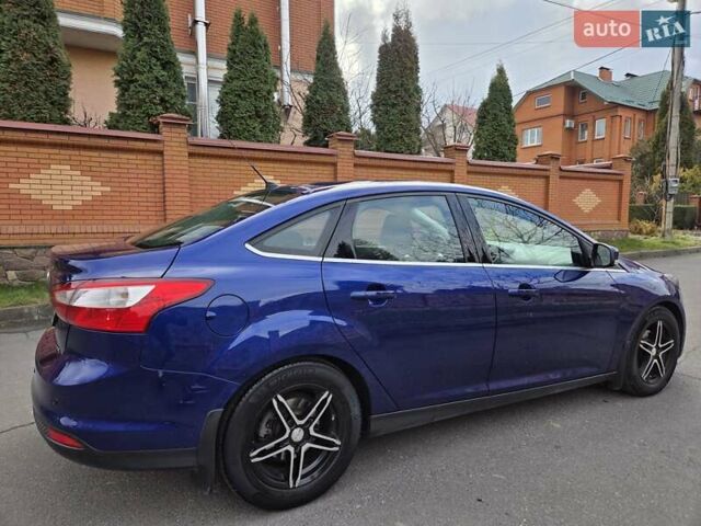 Синій Форд Фокус, об'ємом двигуна 1 л та пробігом 176 тис. км за 7300 $, фото 12 на Automoto.ua