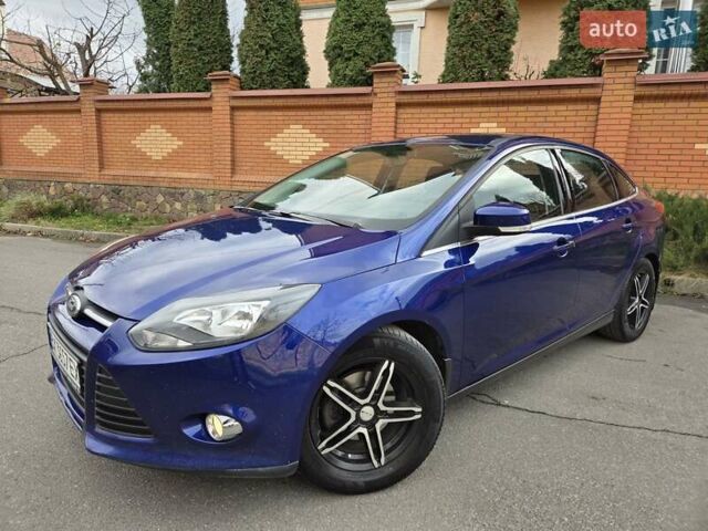 Синій Форд Фокус, об'ємом двигуна 1 л та пробігом 176 тис. км за 7300 $, фото 1 на Automoto.ua