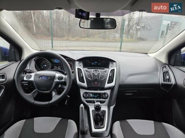Синій Форд Фокус, об'ємом двигуна 1 л та пробігом 176 тис. км за 7300 $, фото 16 на Automoto.ua