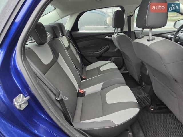 Синій Форд Фокус, об'ємом двигуна 1 л та пробігом 176 тис. км за 7300 $, фото 21 на Automoto.ua