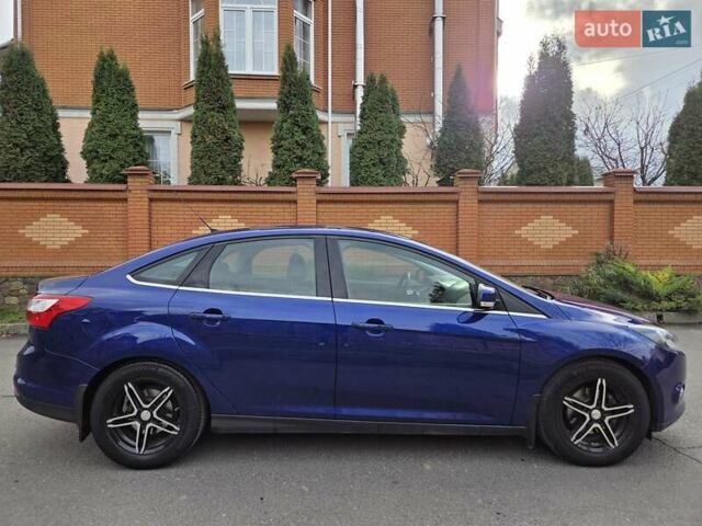 Синій Форд Фокус, об'ємом двигуна 1 л та пробігом 176 тис. км за 7300 $, фото 8 на Automoto.ua