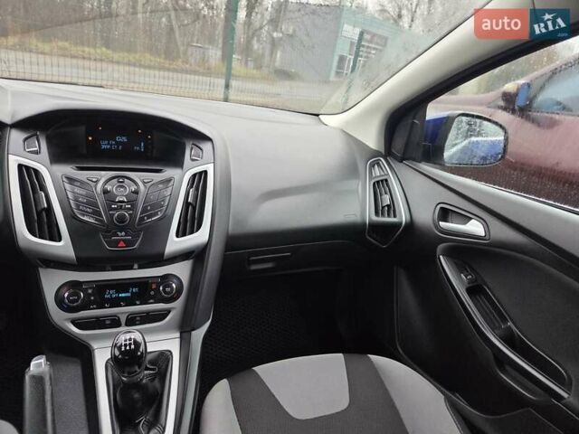 Синій Форд Фокус, об'ємом двигуна 1 л та пробігом 176 тис. км за 7300 $, фото 18 на Automoto.ua