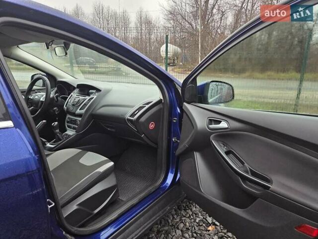 Синій Форд Фокус, об'ємом двигуна 1 л та пробігом 176 тис. км за 7300 $, фото 22 на Automoto.ua