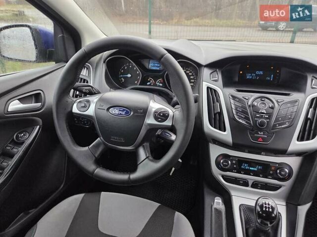 Синій Форд Фокус, об'ємом двигуна 1 л та пробігом 176 тис. км за 7300 $, фото 17 на Automoto.ua