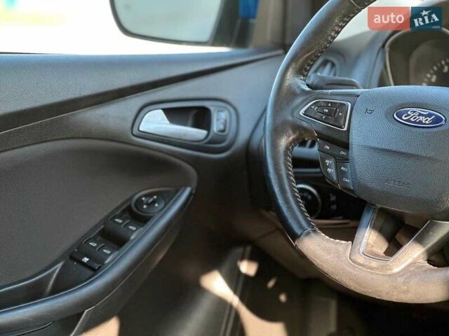 Синий Форд Фокус, объемом двигателя 1 л и пробегом 163 тыс. км за 8490 $, фото 20 на Automoto.ua