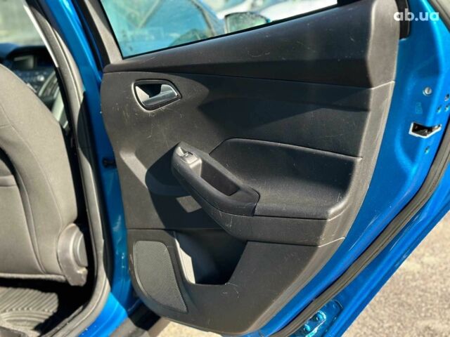 Синій Форд Фокус, об'ємом двигуна 1 л та пробігом 163 тис. км за 8490 $, фото 21 на Automoto.ua