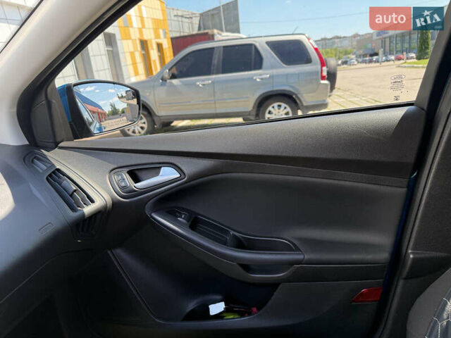 Синій Форд Фокус, об'ємом двигуна 2 л та пробігом 87 тис. км за 8800 $, фото 14 на Automoto.ua