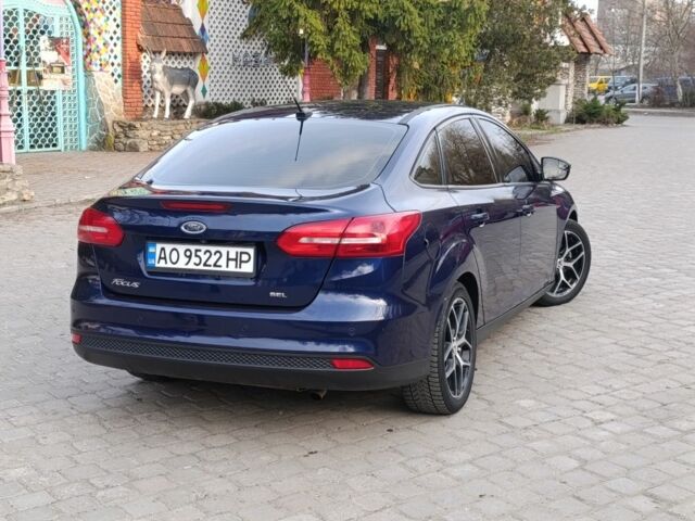 Синій Форд Фокус, об'ємом двигуна 2 л та пробігом 115 тис. км за 8600 $, фото 5 на Automoto.ua