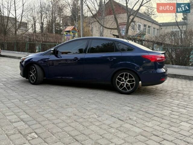 Синій Форд Фокус, об'ємом двигуна 2 л та пробігом 111 тис. км за 9000 $, фото 8 на Automoto.ua