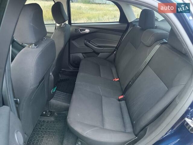 Синій Форд Фокус, об'ємом двигуна 2 л та пробігом 148 тис. км за 9800 $, фото 12 на Automoto.ua