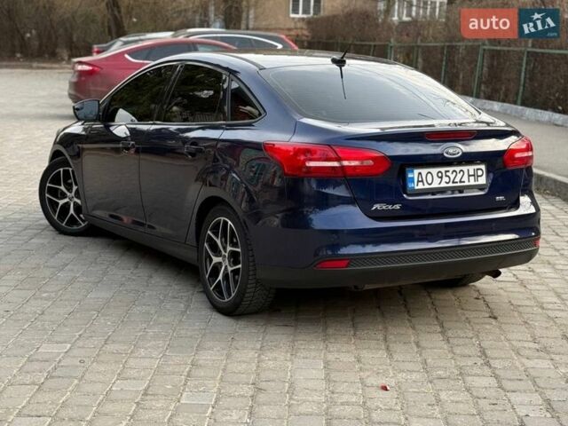 Синій Форд Фокус, об'ємом двигуна 2 л та пробігом 111 тис. км за 9000 $, фото 26 на Automoto.ua