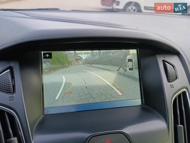 Синій Форд Фокус, об'ємом двигуна 2 л та пробігом 111 тис. км за 9000 $, фото 46 на Automoto.ua