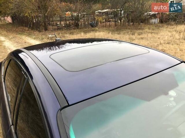 Синій Форд Фокус, об'ємом двигуна 2 л та пробігом 148 тис. км за 9800 $, фото 16 на Automoto.ua