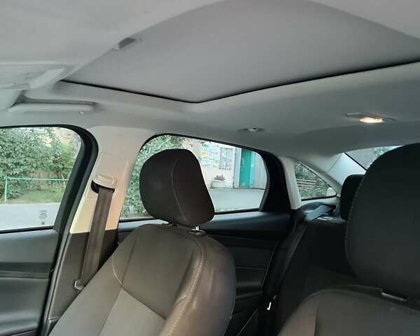 Синій Форд Фокус, об'ємом двигуна 2 л та пробігом 148 тис. км за 9800 $, фото 15 на Automoto.ua