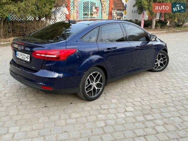 Синій Форд Фокус, об'ємом двигуна 2 л та пробігом 111 тис. км за 9000 $, фото 11 на Automoto.ua