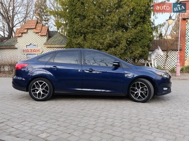 Синій Форд Фокус, об'ємом двигуна 2 л та пробігом 111 тис. км за 9000 $, фото 17 на Automoto.ua