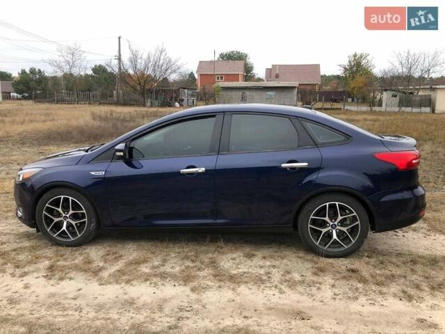 Синій Форд Фокус, об'ємом двигуна 2 л та пробігом 148 тис. км за 9800 $, фото 3 на Automoto.ua
