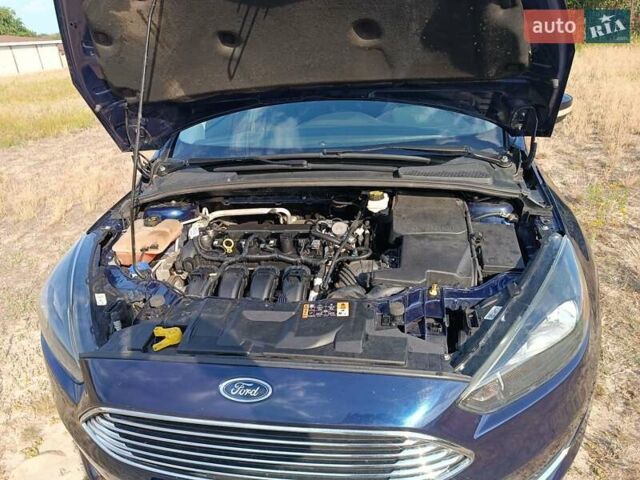 Синій Форд Фокус, об'ємом двигуна 2 л та пробігом 148 тис. км за 9800 $, фото 11 на Automoto.ua